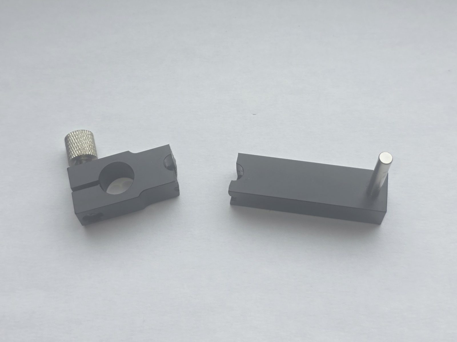The original plastic vinyl cutter blade holder, snapped in two